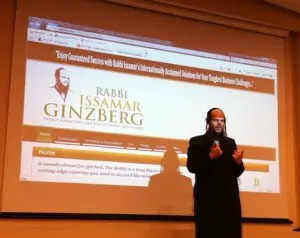 Rabbi Issamar Ginzberg on stage