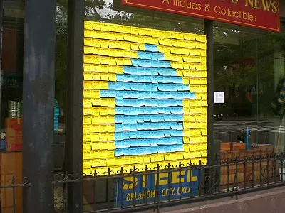 sticky note public art installation on a storefront window